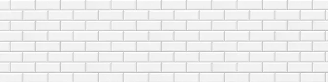Texture de mur en briques blanches, parfaite comme arrière-plan propre et minimaliste pour un site web, transmettant la simplicité et la modernité.