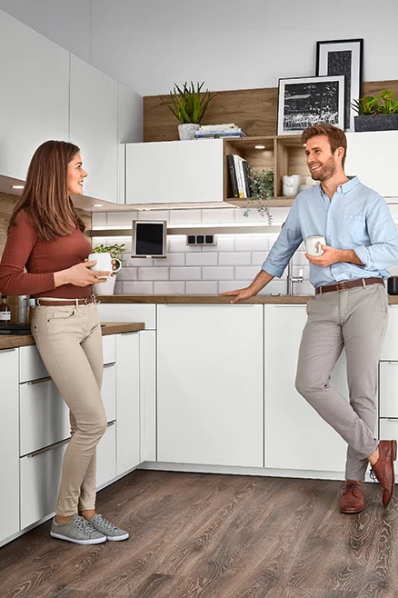 Cuisine avec hauteur de travail adaptée pour une ergonomie optimale - différentes hauteurs actives pour tout le monde.