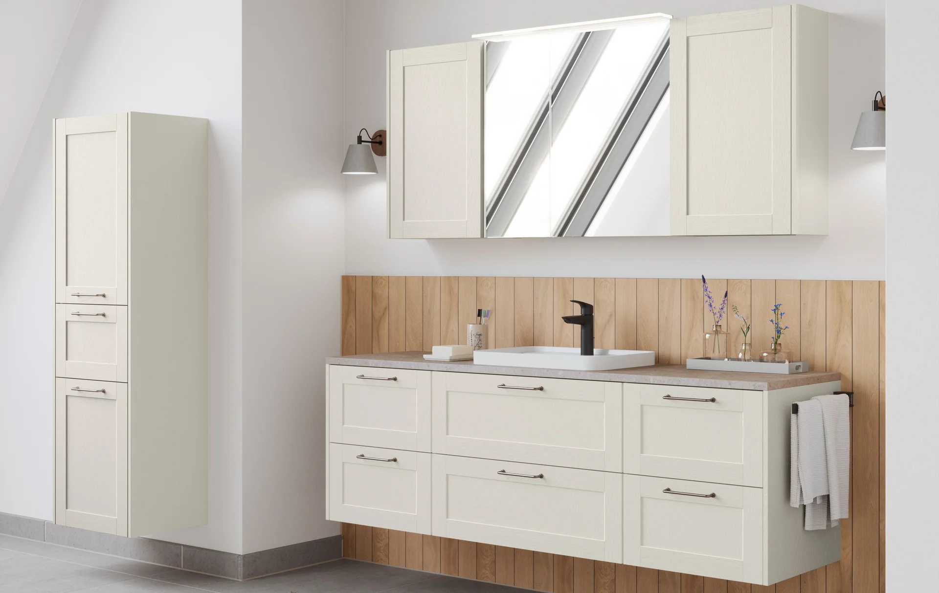 Country-style bathroom furniture in cream with mirror cabinet and wooden back panel.